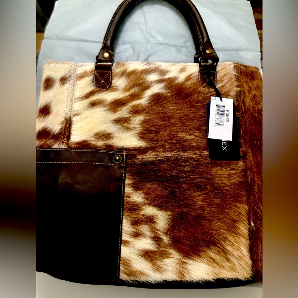 Chloe & lex cowhide tote. Never been used. New with tags.